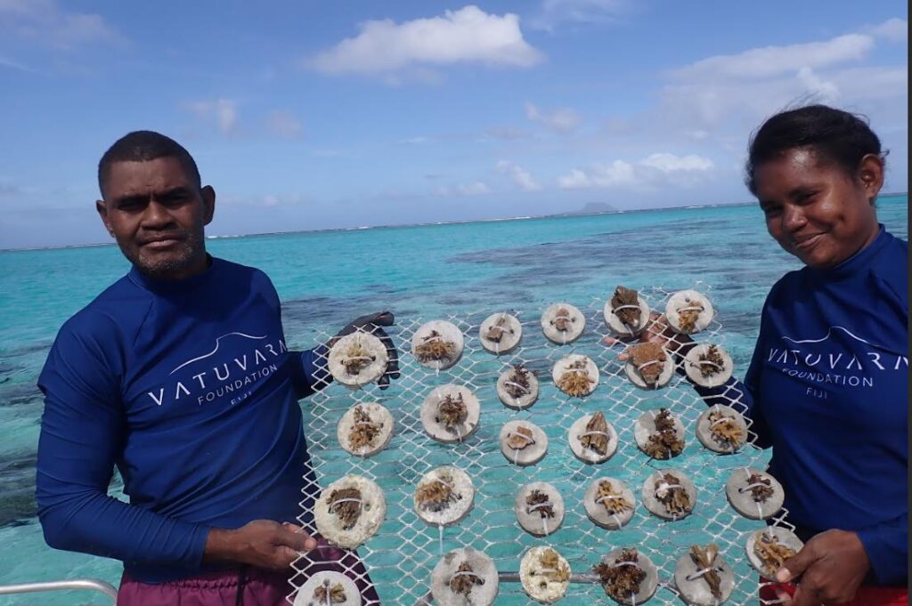 Vatuvara Foundation coral team with cookies and tray method.