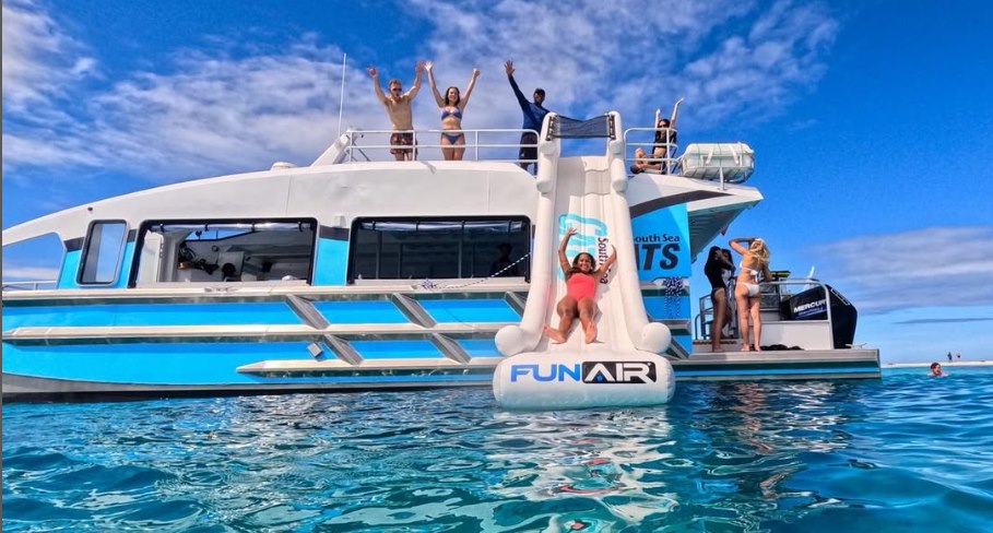 Top deck inflatable slide on South Sea Cats boat