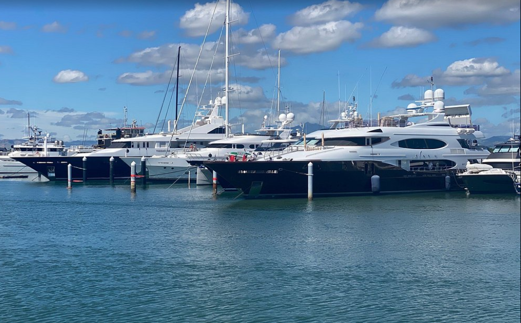 Multiple superyachts docked at Port Denarau Marina on Denarau, Fiji.
