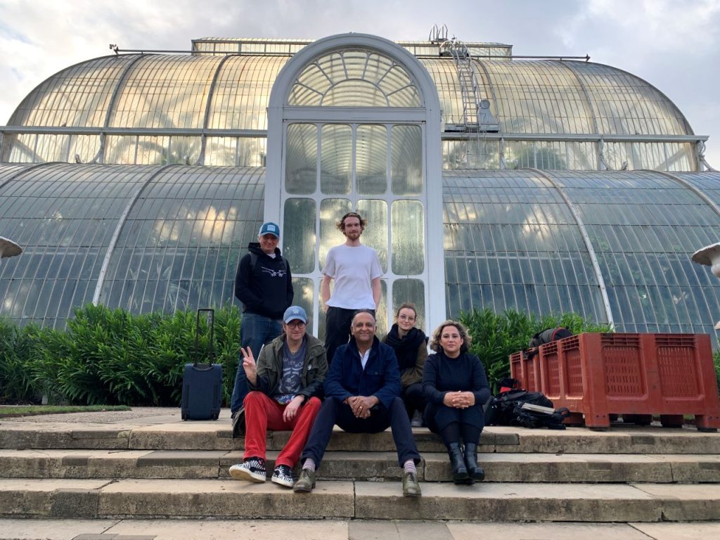 Ajay Chhabra (seated centre) with his UK team.