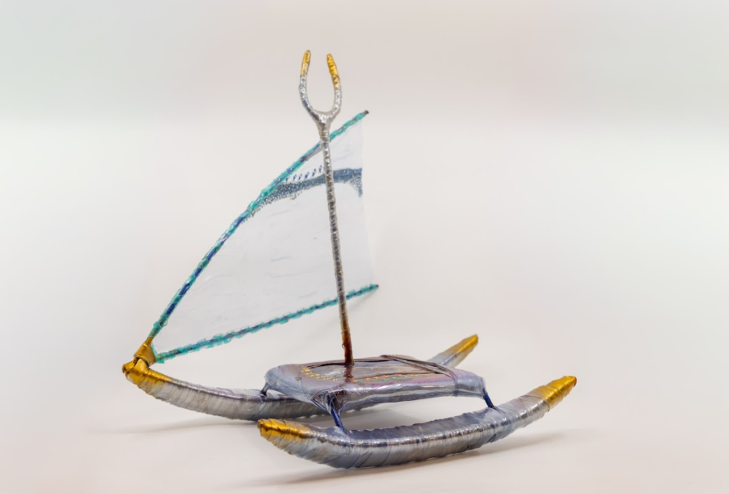 A replica canoe with sail by Stanley Waradi, sailing into the gallery’s future.