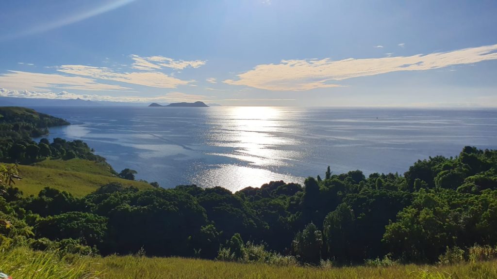 From the heights of Ovalau, the sun shimmers on the ocean and outlying islands stretch into the horizon. EXPLORE Fiji photo.
