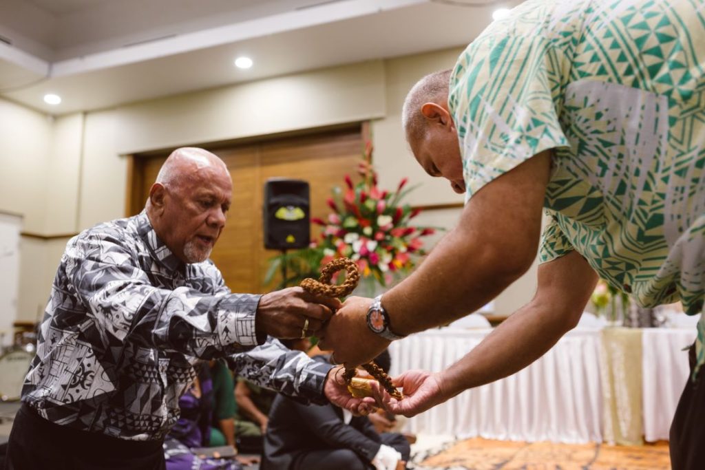 A tabua is offered and received during a wedding ceremony, a gesture of respect, goodwill, and the continuation of traditions across generations. Photo: Allan Stephen.