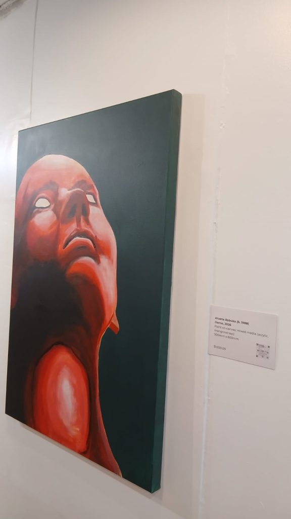 Atueta Rabuka, Domo, mixed media (acrylic and mangrove sap) on canvas, with mangrove “blood” around the voice box and lips, calling for voices against environmental destruction and injustice.
Photo: EXPLORE Fiji.