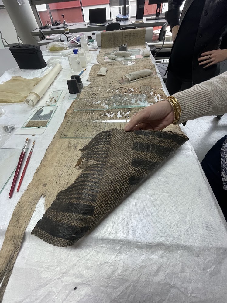 Conservators at the Musée du quai Branly – Jacques Chirac in France carefully examine a historical masi textile, preserving Fijian heritage for the twin exhibitions.