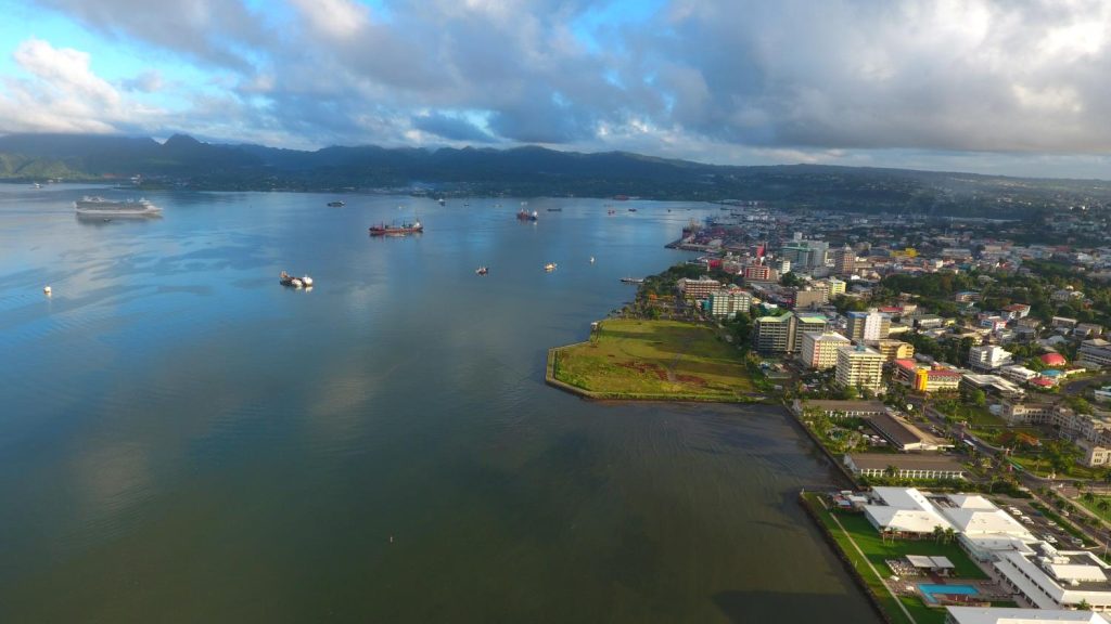 Aerial view of Suva Harbour, Suva’s central business district and surrounding neighbourhoods, showing Fiji’s capital as a regional hub in the Pacific.