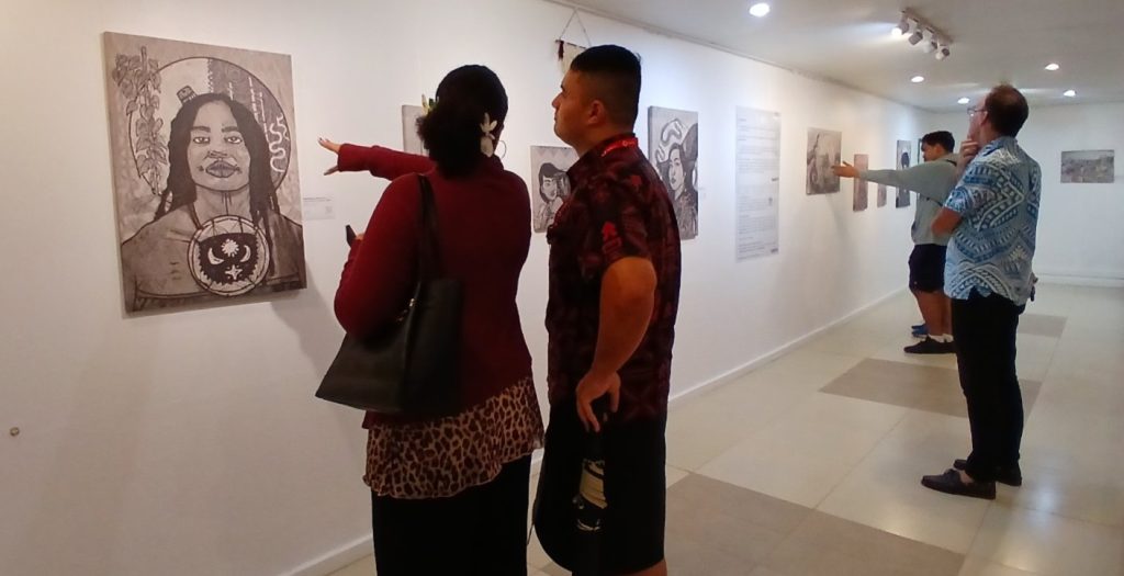 Visitors view Ropate Kama’s Vulaiwerewere exhibition at the Epeli Hauʻofa Art Gallery, Oceania Centre, USP in Suva, reflecting the public response to his exploration of identity and the iTaukei lunar calendar. EXPLORE Fiji photo.

