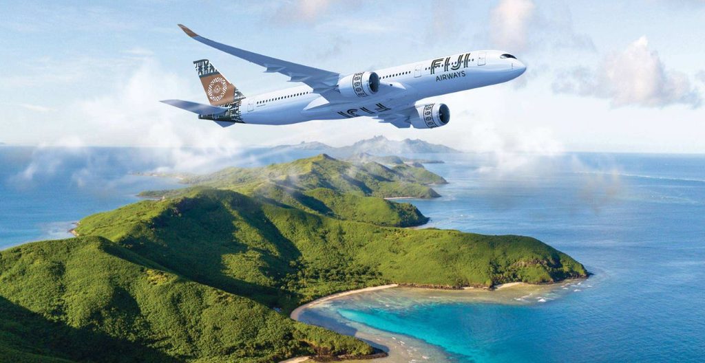 Livery of Fiji Airways aircraft flying over Fiji. 